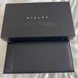 Sisley women’s Black wallet, New with box